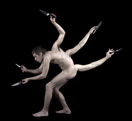 Male nude with five arms holding knives